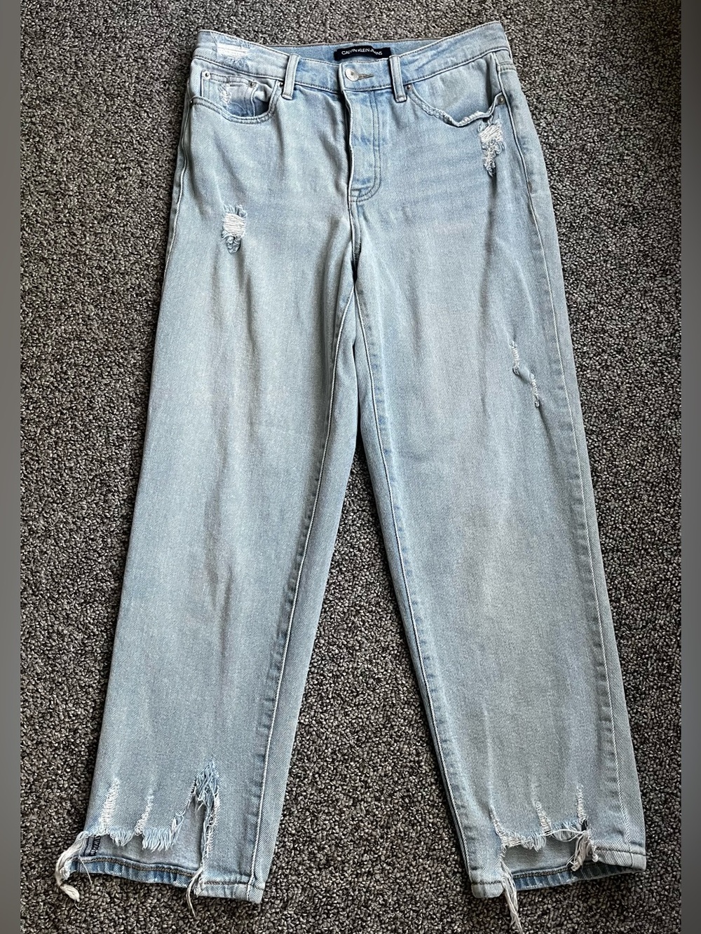 Calvin Klein Women’s Light Wash Distressed Straight Leg Jeans